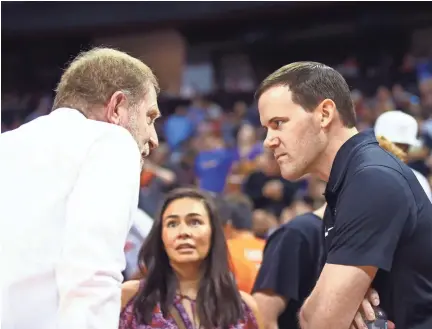  ?? MARK J. REBILAS/ USA TODAY SPORTS ?? Suns General Manager Ryan McDonough (right) talks with owner Robert Sarver during an NBA Summer League game on July 7. Sarver fired McDonough on Monday.