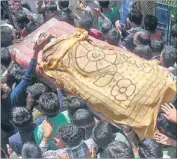  ??  ?? People carrying the body of Irfan Ahmad Gani during a funeral procession at Markundal village in Bandipora district on Sunday; and women grieving over the killing of civilians in the army firing.