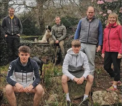  ??  ?? Back from left: Marty Reville, gardener, Joshua Hewlett. Front from left: Cosmo, Myles, Mark and Emma Hewlett.