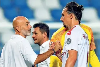  ?? (Getty Images) ?? Intesa Stefano Pioli, 54 anni, confermato alla guida del Milan. Dovrebbe restare anche Zlatan ibrahimovi­c, 38 anni