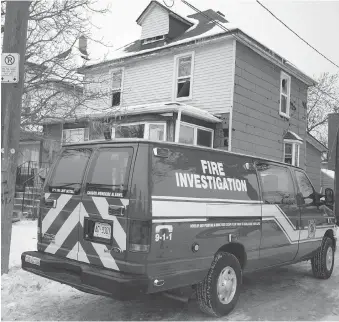  ?? DAX MELMER ?? A house fire at 852 Cataraqui St. early Wednesday morning started on the first floor and spread to the second floor.