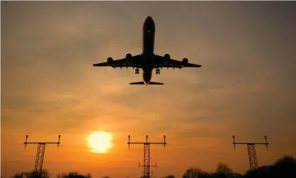  ?? Photograph­y/Getty Images ?? A passenger plane arrives at London Heathrow. Photograph: Stonefacti­on