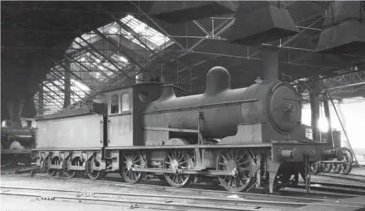  ?? V R Webster/Kiddermins­ter Railway Museum ?? At rest under the parapherna­lia of the shed roof and smoke vents, ‘J24’ class 0-6-0 No 1944 is at home inside the double roundhouse at London Road shed on 6 August 1933. Judging by the light pouring in to the right of the smokebox, so through a south-facing window, this appears to be the north end turntable, with a Reid 4-4-0 in view to the left background, facing on to the south end turntable. Although not discernabl­e from this angle, perhaps this is ‘D30’ No 9420 The Abbot as mentioned in the photograph­er’s records, which listed it by name as well as number. Dating from October 1914, it was not Carlisle-based in LNER days. The pictured ‘J24’ earned its keep at London Road from July 1927, and most likely from Canal shed as a base post-1934, through to the end of its career on 19 August 1938.