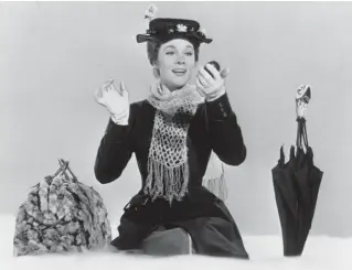  ?? DISNEY ?? Julie Andrews made her feature film debut in the 1964 musical “Mary Poppins.” The carpet bag, left, is an item seen in Disney Plus’ new docuseries “Prop Culture.”