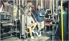  ?? Israel for The Washington Post — Sasha ?? Sumit and Vanit Sharma, brothers and owners of Rupee Beer, brew and package their beer at The Dorchester Brewing Company in Boston.