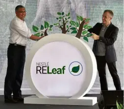  ??  ?? Dr Shamsul (left) with Aranols at the launch of Project ReLeaf in Putrajaya.
