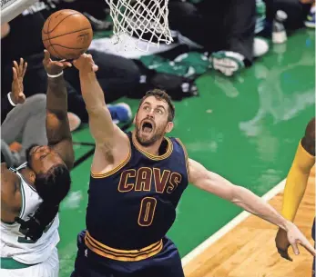  ?? GREG M. COOPER, USA TODAY SPORTS ?? In the playoffs, Kevin Love (No. 0) is third in scoring for the Cavaliers at 15.8 points per game.