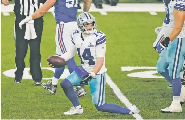  ?? COREY SIPKIN/ASSOCIATED PRESS ?? Dallas Cowboys quarterbac­k Andy Dalton reacts after being sacked Sunday against the New York Giants.