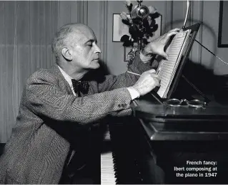  ??  ?? French fancy: Ibert composing at the piano in 1947