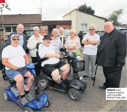  ??  ?? United Laurel Gardens residents with Councillor Michael Coyle, right