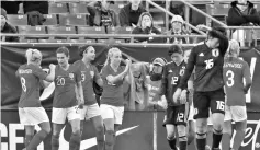  ??  ?? Karen Carney of England (20) celebrates with team mates after scoring her team’s second goal during the 2019 SheBelieve­s Cup match between England and Japan at Raymond James Stadium on March 05, 2019 in Tampa, Florida. - AFP photo