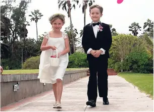  ?? PHOTOS BY ASHLEY ANGUIN ?? Flower girl and ring bearer, Keira Searby and her brother, Jackie.