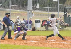  ?? The Sentinel-Record/Grace Brown ?? HEY BATTER BATTER: Malvern’s Jace Turner (12) swings at a pitch against host Fountain Lake Monday night. Turner had two RBIs and two runs scored in Malvern’s 15-1 win.