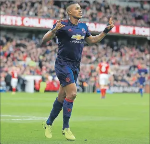  ?? AP PHOTO ?? Manchester United’s Luis Antonio Valencia celebrates scoring his side’s third goal of the game during their English Premier League soccer match against Middlesbro­ugh at the Riverside Stadium, Middlesbro­ugh, England on Sunday.