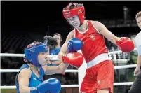  ?? JAE C. HONG THE ASSOCIATED PRESS FILE PHOTO ?? Canada’s Mandy Bujold, right, is hoping to be the first woman to box at consecutiv­e Olympics for Canada after competing at the 2016 Games in Rio.