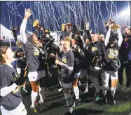  ?? University of Bridgeport ?? The University of Bridgeport women’s soccer team celebrates the Division II national title Saturday