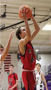  ?? The Sentinel-Record/James Leigh ?? ■ Cutter Morning Star’s Hunter Yancy (14) goes up for a shot during Tuesday’s win over Perryville in the Fountain Lake Christmas Classic.