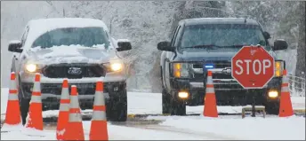  ?? RICK ROMANCITO/For the Taos News ?? A roadblock was set up in 2020 at the southern entrance to Taos Pueblo to restrict access to tribal lands as the COVID-19 coronaviru­s swept through Northern New Mexico.