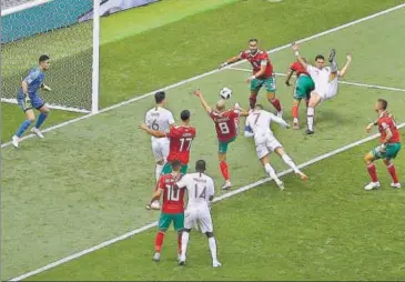  ?? AP ?? Portugal captain Cristiano Ronaldo (No 7) heads in the match’s only goal against Morocco in Moscow on Wednesday.