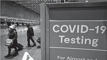  ?? Charles Krupa/associated Press file photo ?? The Biden administra­tion is dropping the COVID test mandate for incoming internatio­nal flights as of midnight Sunday. The CDC will review the move in 90 days and could reinstate it.