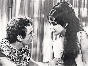  ?? 20TH CENTURY FOX ?? Elizabeth Taylor and Richard Burton’s affair during the filming of ‘‘Cleopatra’’ created a scandal in 1963. It is the subject of a new play.