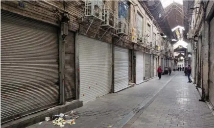  ?? Photograph: Wana News Agency/Reuters ?? Shops in Tehran are closed after recent protests, in November.