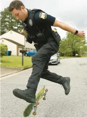  ?? STAFF FILE ?? Virginia Beach police Officer Ryan Borman’s “skatecop” persona blossomed three years ago. He demonstrat­es a 360 on his skateboard in 2020.