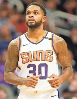  ?? MICHAEL CHOW/THE REPUBLIC ?? The Suns acquired guard Troy Daniels from Memphis, and since coming to Phoenix, he’s establishe­d himself as a top 3-point shooter in the league.