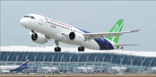  ?? CHEN ZIKUAN / FOR CHINA DAILY ?? A C919 airplane takes off from the Shanghai Pudong Internatio­nal Airport for a test flight to Xi’an, Northwest China’s Shaanxi province, on Nov 10.