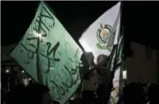  ?? AP PHOTO, FILE ?? In this 2014 photo, Jordanian children chant anti-Israel slogans during the Muslim Brotherhoo­d Islamic movement protest in front of the Israeli embassy, to condemn the Israeli bombing of Gaza and to demand from Hamas leaders to not accept the truce...