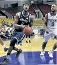  ?? TARA KRAJEWSKI/ SPECIAL TO POSTMEDIA NETWORK ?? Niagara River Lions forward Richard Amardi goes in for the shot in National Basketball League of Canada action Tuesday night against the Kitchener-Waterloo Titans at The Aud.