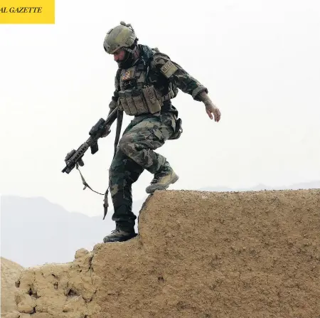  ?? MAYA ALLERUZZO / THE ASSOCIATED PRESS ?? A U.S. special op forces service member goes on joint patrol with Afghan National Army soldiers in Shewan, Farah province, in this 2009 file photo. Reversing his past calls for a speedy exit, President Donald Trump recommitte­d the U.S. to the...