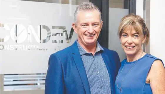  ?? Picture: TERTIUS PICKARD ?? Change is afoot ... Condev Constructi­on’s owners Steve and Tracy Marais at their office in Robina..