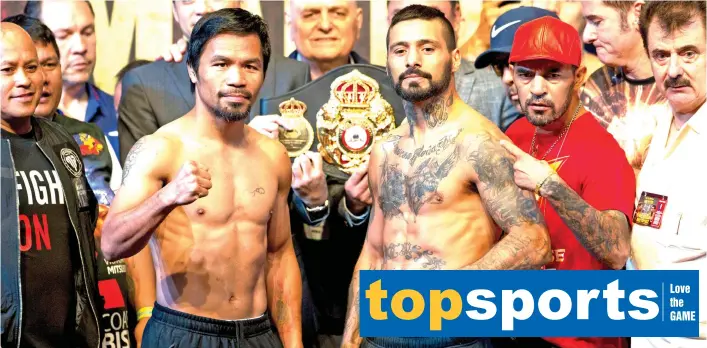  ?? AP Photo ?? WEIGH IN. Philippine senator and boxing hero Manny Pacquiao, left, and Argentine World Boxing Associatio­n welterweig­ht champion Lucas Matthysse pose after weigh-ins in Kuala Lumpur, Malaysia, Saturday, July 14, 2018. Matthysse and Pacquiao are...