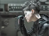  ?? REINER BAJO/ SONY PICTURES ?? Lisbeth Salander (Claire Foy, the third actress to play her) takes on another mission in “The Girl in the Spider’s Web.”