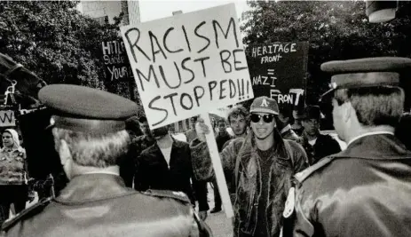  ?? BERNARD WEIL/TORONTO STAR FILE PHOTO ?? An anti-racism rally in Toronto in 1992 during the time when the Heritage Front was at its most active in Canada.