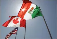  ?? THE CANADIAN PRESS/AP/JUDI BOTTONI ?? The Canadian government is getting kudos from unions for proposing that both Mexico and the United States commit to improved labour standards in a rewritten North American free trade agreement.