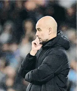  ?? OLI SCARFF / AFP ?? Guardiola durant el partit entre el Manchester City i el Madrid