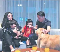  ?? PROVIDED TO CHINA DAILY ?? A family find time to bond after dinner at a rented home booked through Zhubaijia, in Chiang Mai, Thailand, earlier this year.