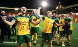  ?? Photograph: Nigel French/PA ?? The Horsham players celebrate following their first round draw against Barnsley at Oakwell.