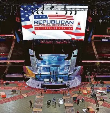  ?? AP ?? Workers prepare the Quicken Loans Arena in downtown Cleveland, Ohio, which will host the ■ Republican National Convention from Monday.