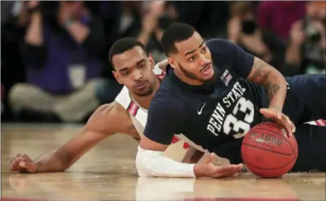  ?? JULIE JACOBSON — THE ASSOCIATED PRESS ?? Penn State guard Shep Garner, right, looks to pass as he scrambles against Ohio State forward 10 Conference tournament game between the teams at Madison Square Garden March 2. Keita Bates-Diop in a Big