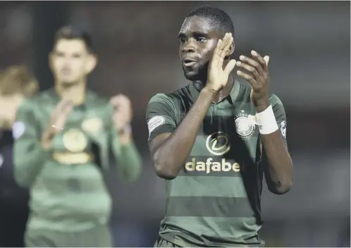  ??  ?? Celtic’s Odsonne Edouard applauds the fans at full-time following his goalscorin­g debut in the 4-1 away win over Hamilton Academical.