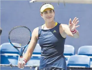  ?? AFP ?? Muguruza no se encontró con una oponente que hiciera peligrar en algún momento su triunfo en el debut del Masters 1000 de Miami
//