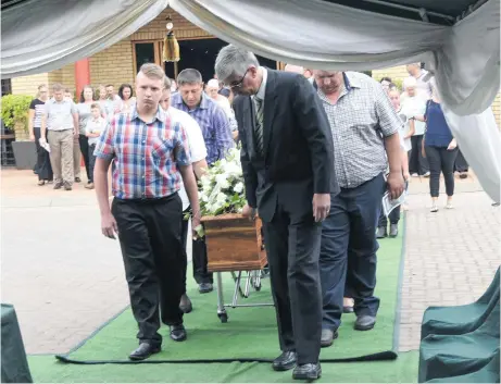  ?? Picture: Nigel Sibanda ?? TRAGIC GOODBYE The coffin of Grade 8 pupil Jandre Steyn leaves his funeral service at River of Life Family Church in Vanderbijl­park, Vaal, yesterday. He was one of four pupils who died when a cement walkway linking two buildings at his school, Hoërskool Driehoek, collapsed, trapping a number of students underneath.