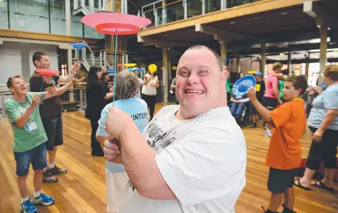 ?? Picture: MITCH BEAR ?? FIRST TIME: Leigh Creighton has a go at plate spinning at the Have A Say conference at Deakin.