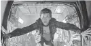  ?? JAAP BUITENDIJK ?? A teen (Tye Sheridan) escapes online in “Ready Player One.”