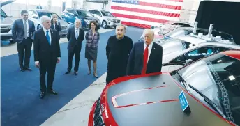  ?? (Jonathan Ernst/Reuters) ?? US PRESIDENT Donald Trump tours new cars with auto-industry leaders, including Fiat Chrysler CEO Sergio Marchionne, earlier this year at the American Center for Mobility, a test facility for autonomous-driving technology in Ypsilanti Township, Michigan.