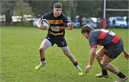  ?? ?? Thornbury’s Jake Wood stepping through the Wellington defence for his try