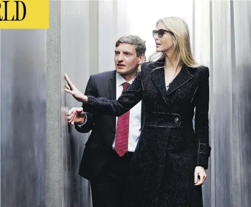  ?? MICHAEL SOHN / AFP / GETTY IMAGES ?? Ivanka Trump, daughter to U.S. President Donald Trump, visits the Holocaust memorial with its director, Uwe Neumaerker, in Berlin Tuesday. Trump is on her first internatio­nal trip as an official member of the administra­tion.